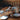 clear glass bowl on brown wooden table