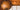 brown round decor on white wooden wall