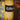 a close up of a yellow fire hydrant with a label on it