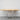 a wooden table sitting on top of a tiled floor